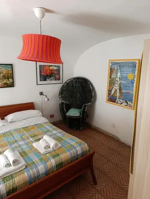 Letto o letti in una camera di Capa e Coda Appartamento in centro storico