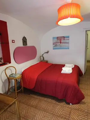 Letto o letti in una camera di Capa e Coda Appartamento in centro storico