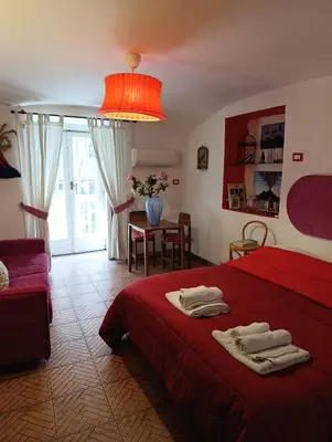 Letto o letti in una camera di Capa e Coda Appartamento in centro storico