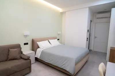 Letto o letti in una camera di Museo19 Home