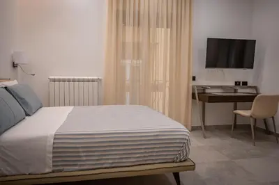 Letto o letti in una camera di Museo19 Home