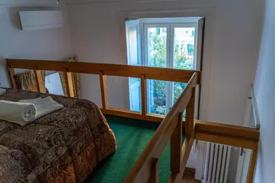 Letto o letti in una camera di Casa Antica Pizzofalcone