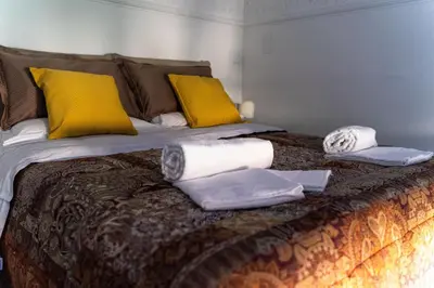 Letto o letti in una camera di Casa Antica Pizzofalcone