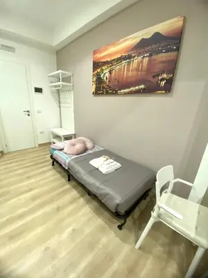 Letto o letti in una camera di Michelangelo 80 Apartment