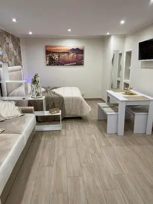 Letto o letti in una camera di La Dimora Dei Sogni SEDIL CAPUANO HOME SUITE