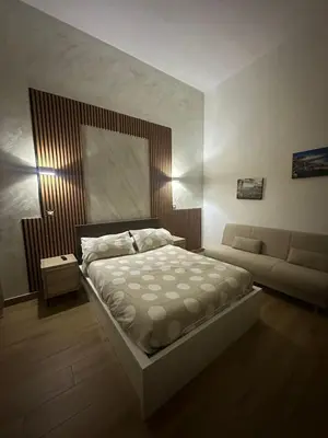 Letto o letti in una camera di ToledoHomeNapoli