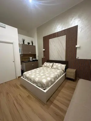 Letto o letti in una camera di ToledoHomeNapoli