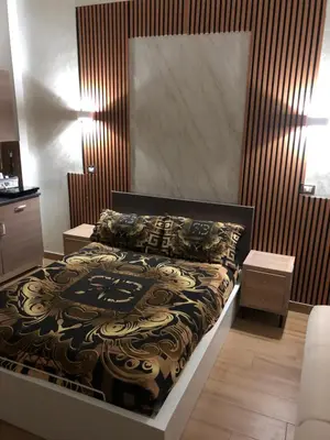 Letto o letti in una camera di ToledoHomeNapoli