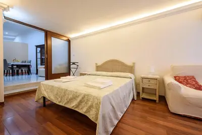Letto o letti in una camera di Via Avvocata 25