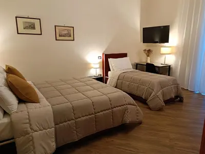 Letto o letti in una camera di Gibus
