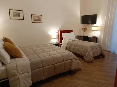 Letto o letti in una camera di Gibus