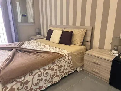 Letto o letti in una camera di B & B VICO GRANDE