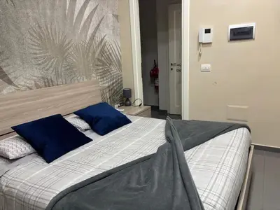 Letto o letti in una camera di B & B VICO GRANDE