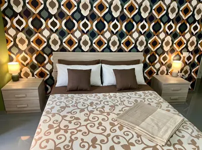 Letto o letti in una camera di B & B VICO GRANDE