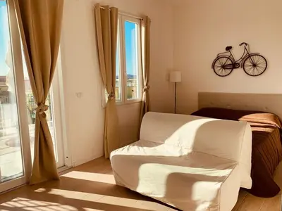 Letto o letti in una camera di Attico Al Vomero