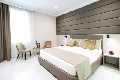 Letto o letti in una camera di Imperatrice Suites