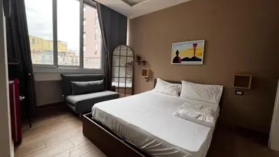 Letto o letti in una camera di Vespucci Rooms