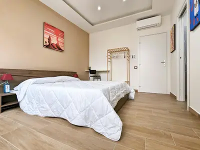 Letto o letti in una camera di Vespucci Rooms