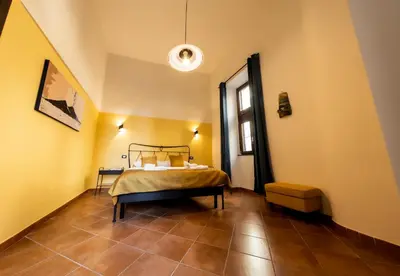 Letto o letti in una camera di Sebeto Duomo