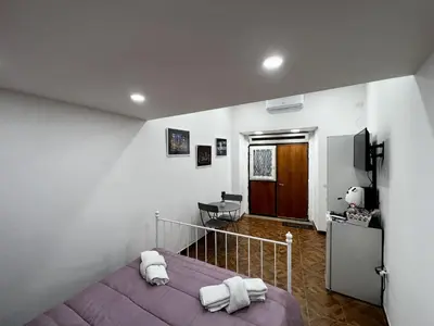 Letto o letti in una camera di Piazza Carità Love Suite