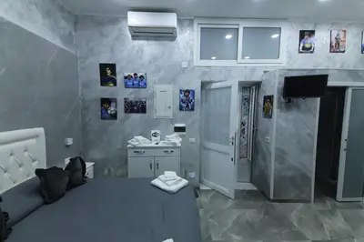 Letto o letti in una camera di Al Maradona