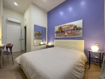 Letto o letti in una camera di Mille Colori