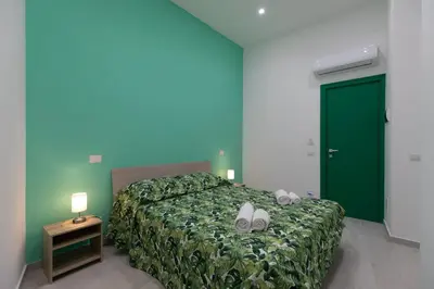 Letto o letti in una camera di MY BRILLIANT HOME WITH JACUZZI 2 STEPS FROM St TOLEDO