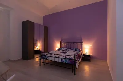 Letto o letti in una camera di MY BRILLIANT HOME WITH JACUZZI 2 STEPS FROM St TOLEDO