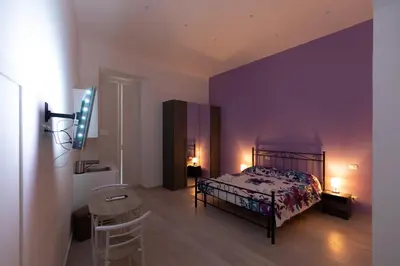 Letto o letti in una camera di MY BRILLIANT HOME WITH JACUZZI 2 STEPS FROM St TOLEDO