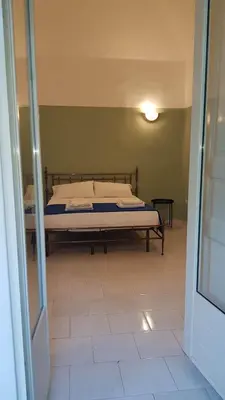 Letto o letti in una camera di Santa Chiara Home Spaccanapoli