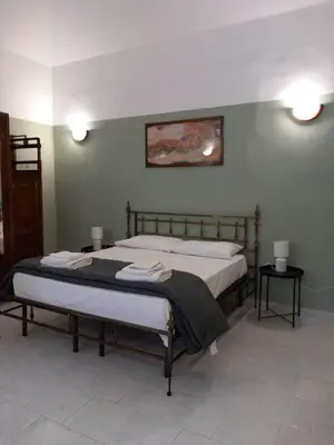 Letto o letti in una camera di Santa Chiara Home Spaccanapoli