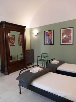 Letto o letti in una camera di Santa Chiara Home Spaccanapoli