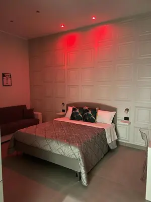 Letto o letti in una camera di Casa vacanza carmè