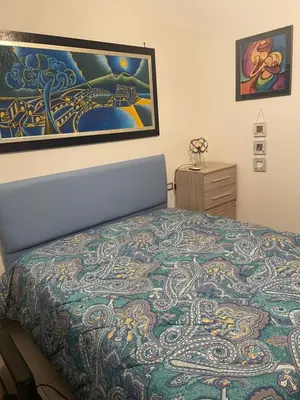 Letto o letti in una camera di La casa di Alfredo al Vomero