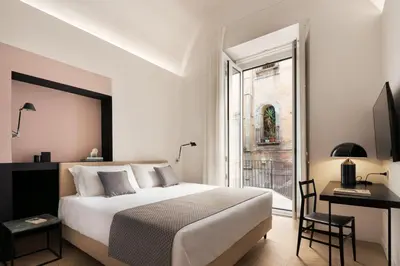 Letto o letti in una camera di Mirabilis Relais
