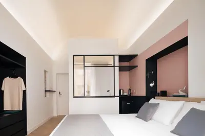 Letto o letti in una camera di Mirabilis Relais