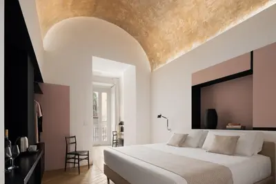 Letto o letti in una camera di Mirabilis Relais