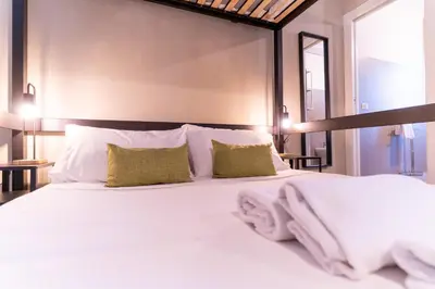 Letto o letti in una camera di Tiny Daisy House