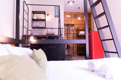 Letto o letti in una camera di Tiny Daisy House