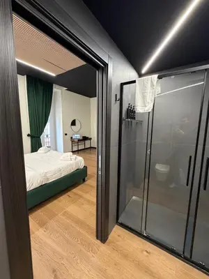 Letto o letti in una camera di Chiatamone Neapolis Apartment