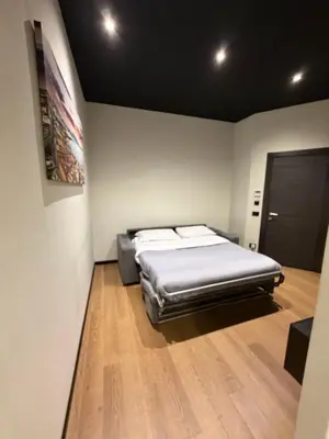 Letto o letti in una camera di Chiatamone Neapolis Apartment