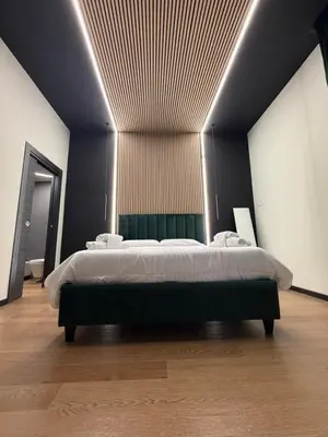 Letto o letti in una camera di Chiatamone Neapolis Apartment