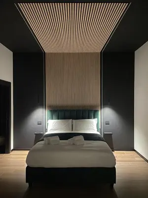 Letto o letti in una camera di Chiatamone Neapolis Apartment