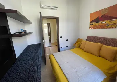 Letto o letti in una camera di Easy Naples