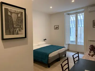 Letto o letti in una camera di FondacOlivella