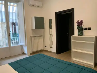 Letto o letti in una camera di FondacOlivella