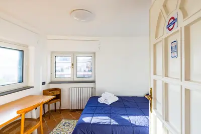 Letto o letti in una camera di Villa Paola - Hidden Panoramic Garden and Terr...