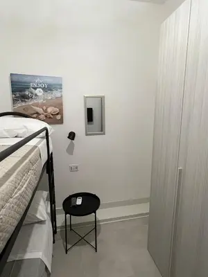 Letto o letti in una camera di Casa e Mariella