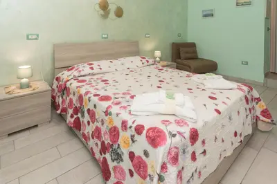 Letto o letti in una camera di VICOLO 55 Guest House