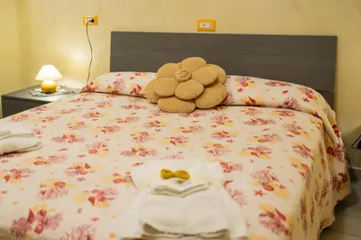 Letto o letti in una camera di VICOLO 55 Guest House